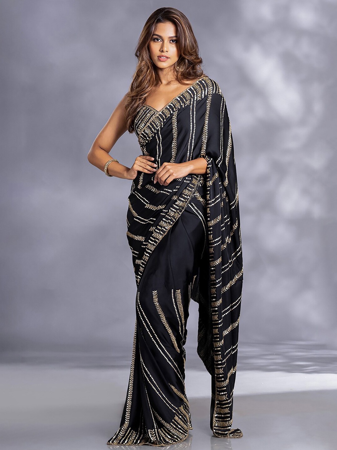 

Mitera Black Embellished Poly Georgette Saree