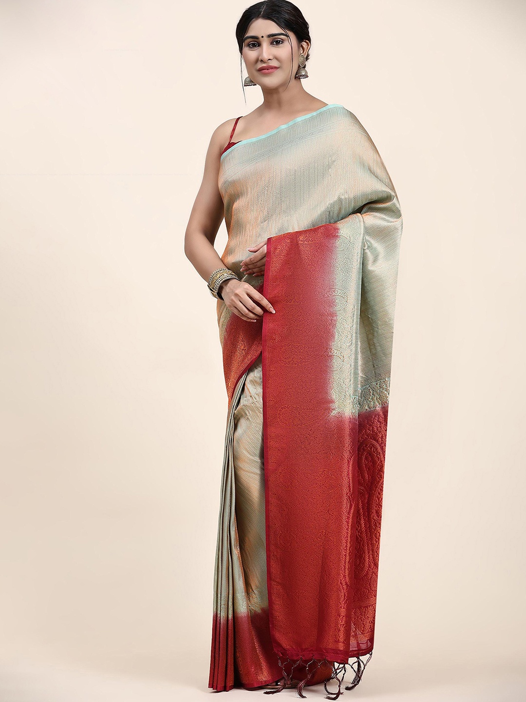 

Mitera Blue & Red Ethnic Motifs Woven Design Zari Saree