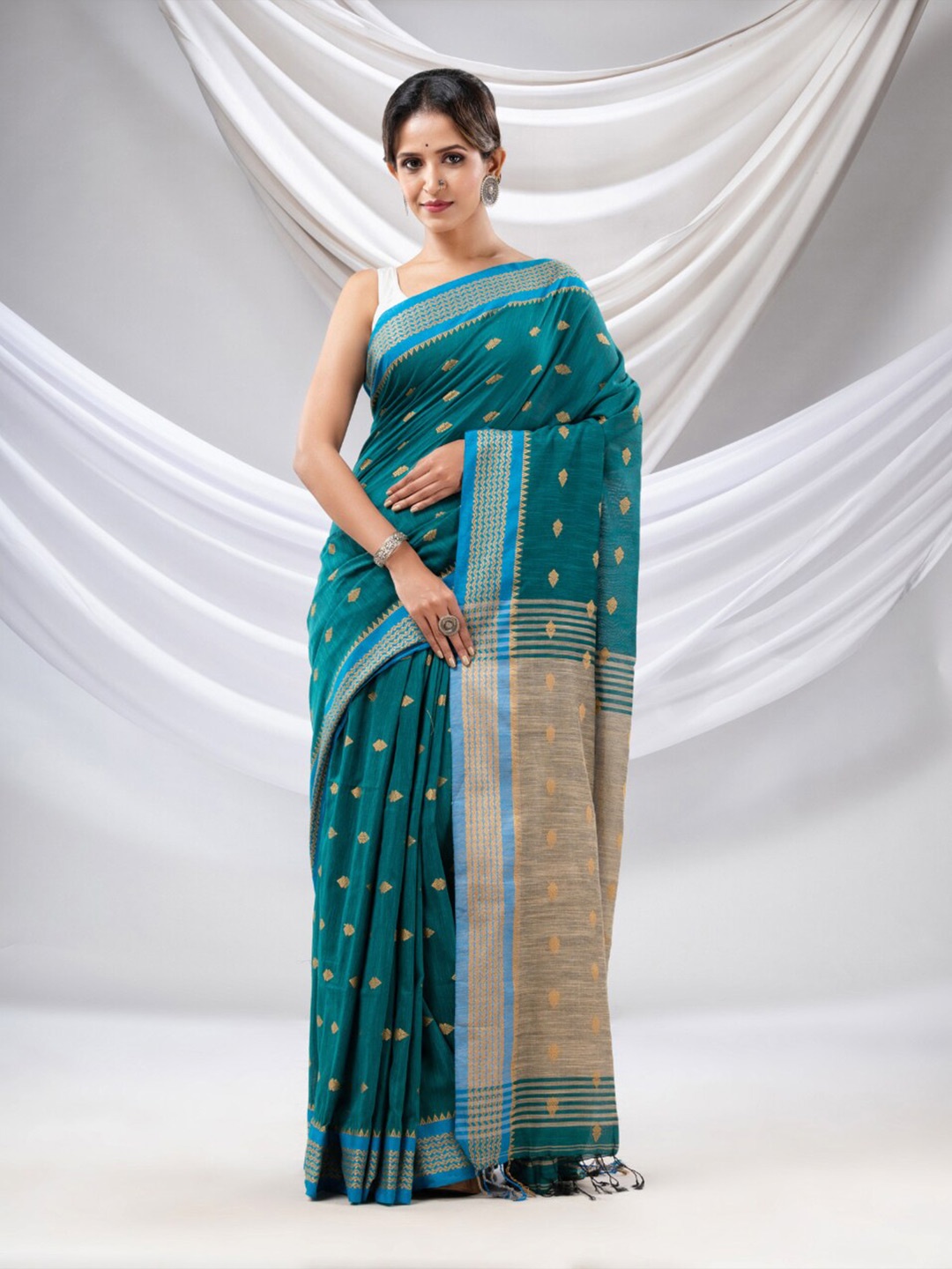 

Charukriti Woven Design Pure Cotton Saree, Teal