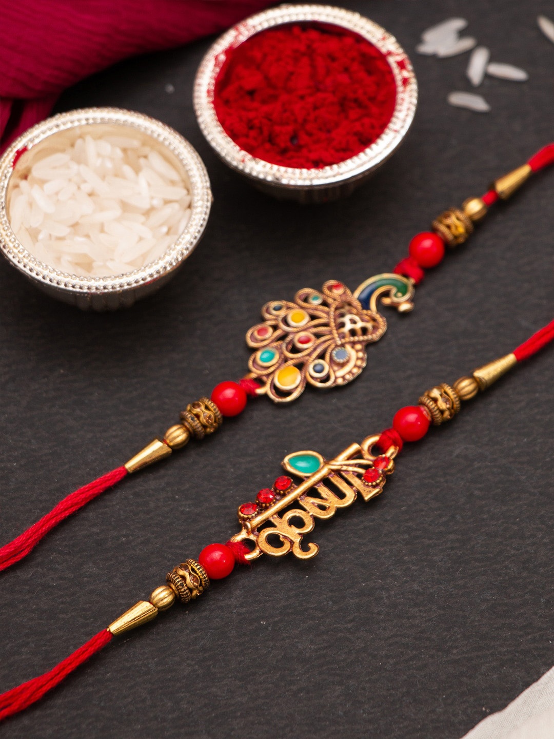 

CraftVatika Unisex Set of 2 Krishna Peacock Thread Rakhi, Red