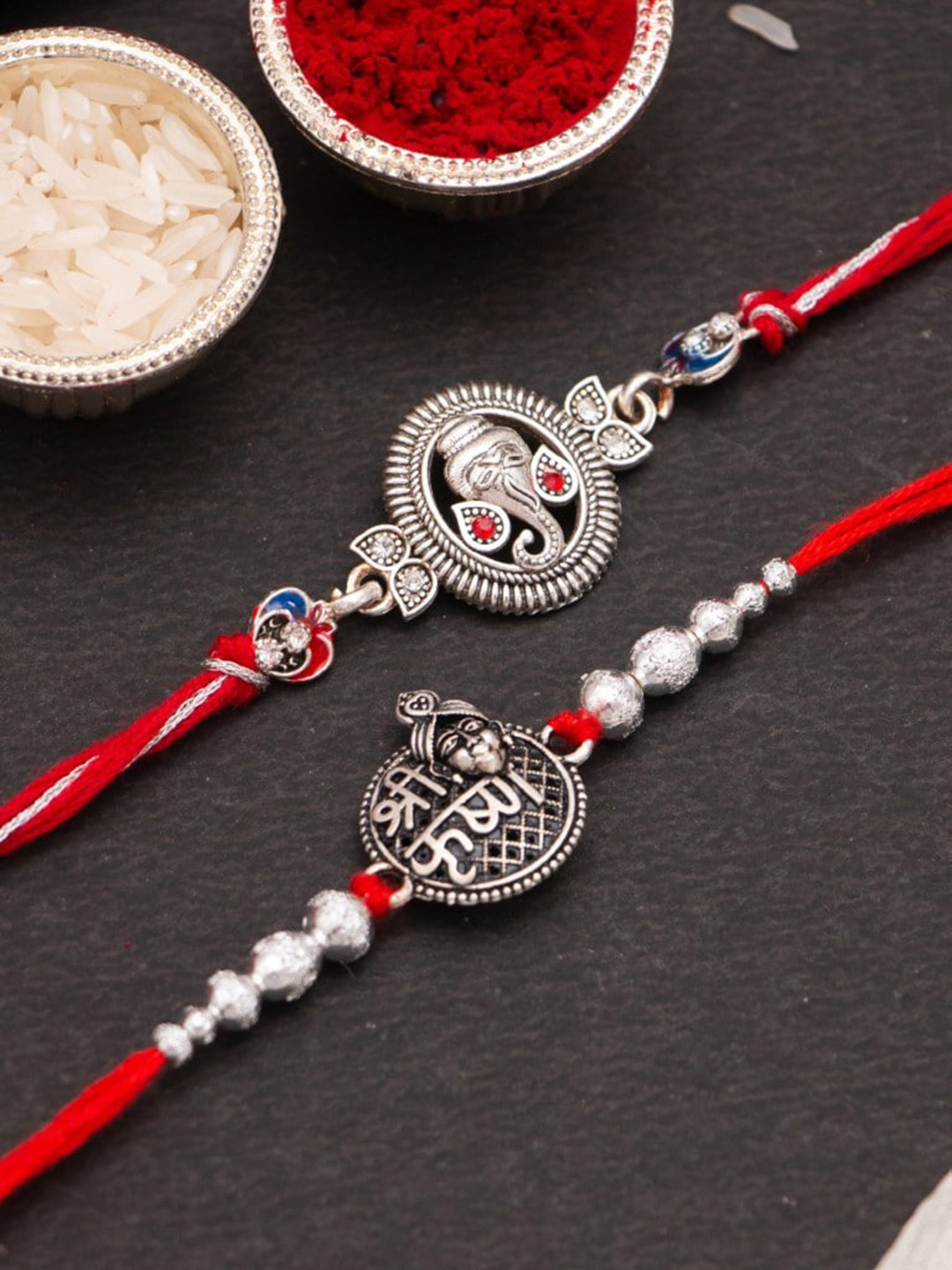 

CraftVatika Unisex Set Of 2 Ganesha Rakhi Gift Set, Silver