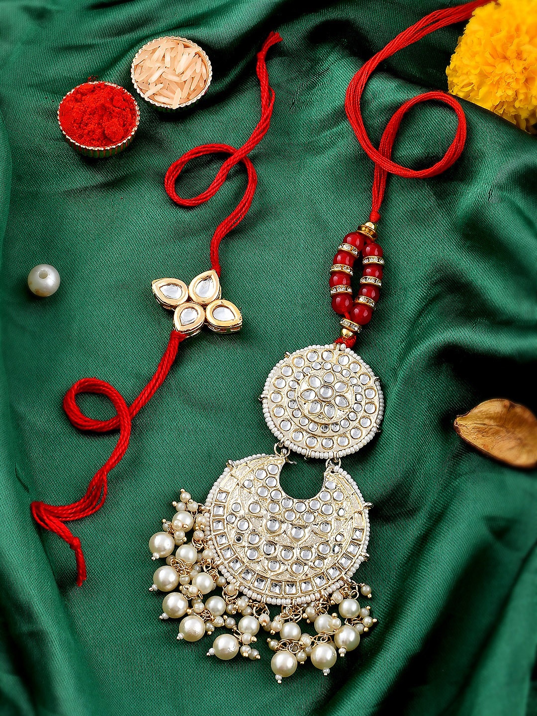 

Shoshaa Bhaiya Bhabhi Rakhi Lumba Maangtika with Roli Chawal Gift Set, Red