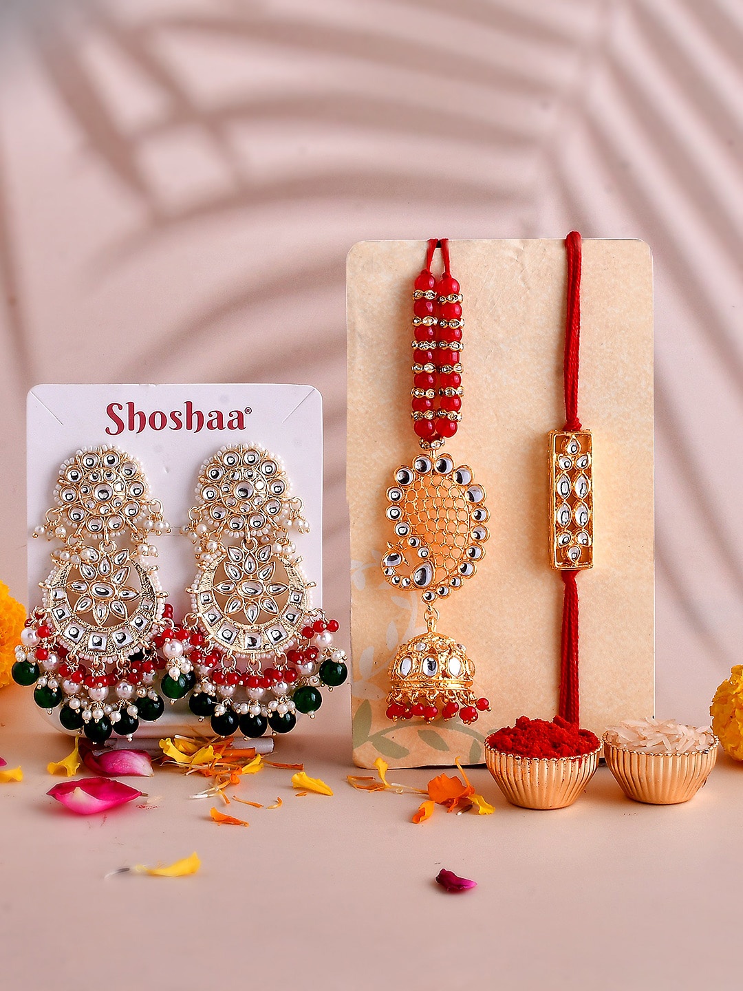

Shoshaa Unisex Set Of 3 Kundan Rakhi & lumba with Earrings & Roli Chawal Gift Set, Red