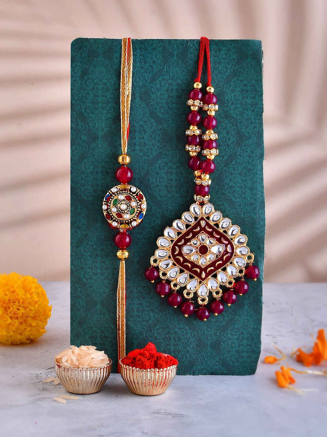 

Shoshaa Kundan Studded Bhaiya Bhabhi Rakhi & Lumba with Roli Chawal Gift Set, Red