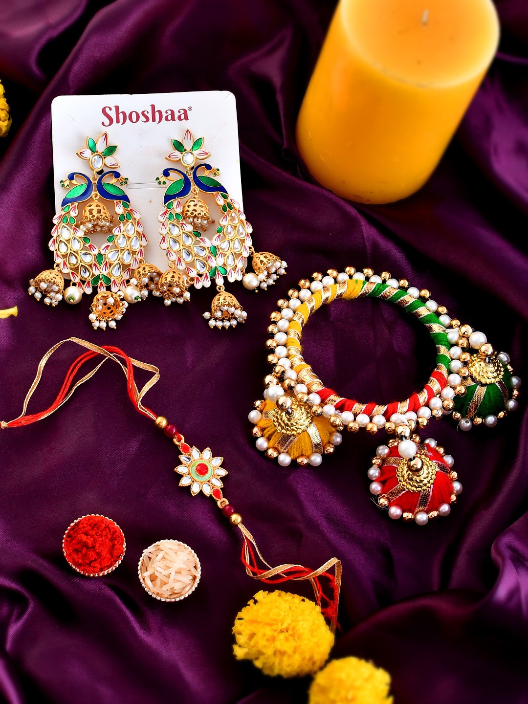 

Shoshaa Bhaiya Bhabhi Rakhi & Beaded Bangle with Roli Chawal Earrings Gift Set, Red