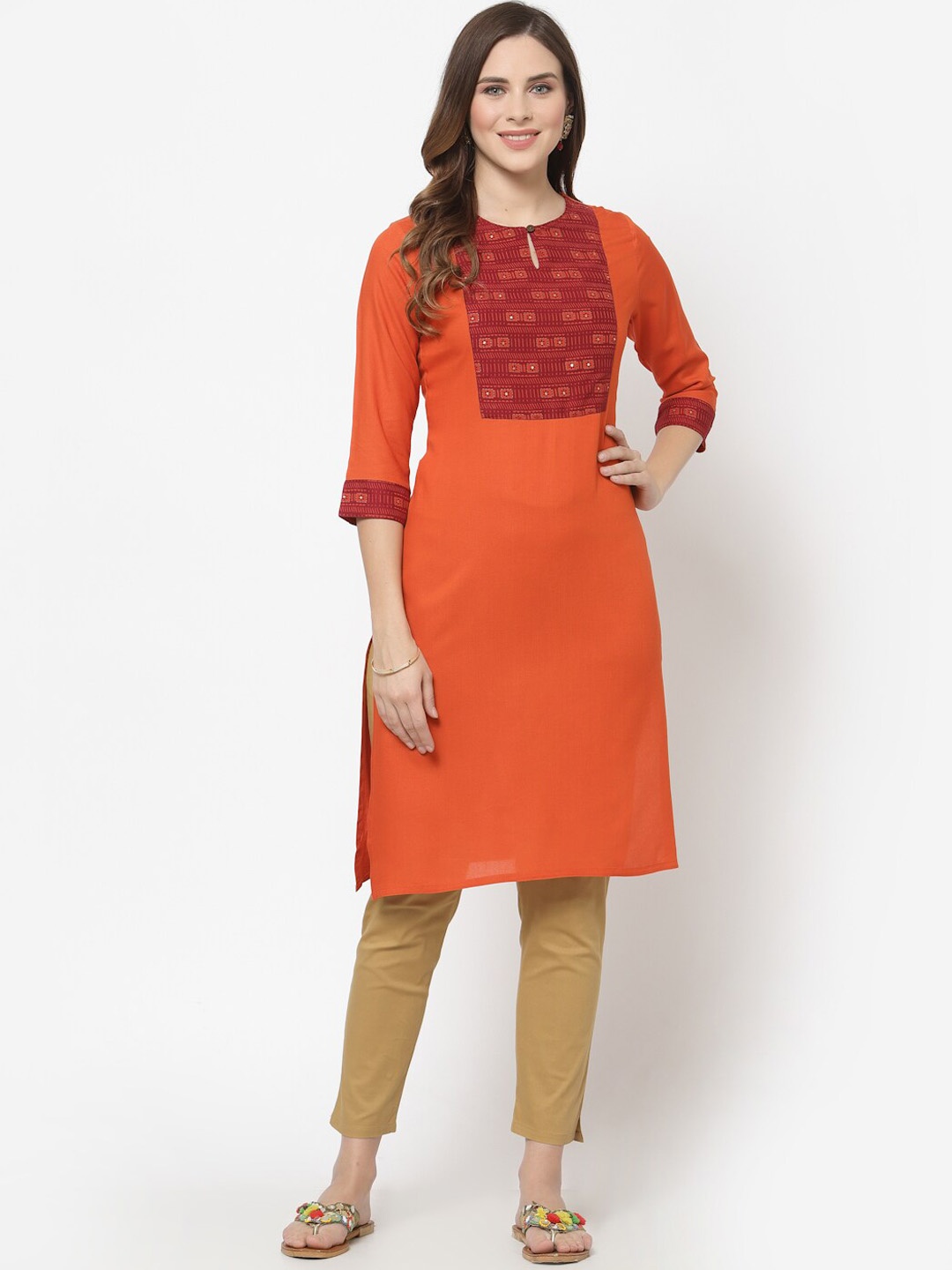 

Avipsa Geometric Yoke Design Keyhole Neck Straight Kurta, Rust