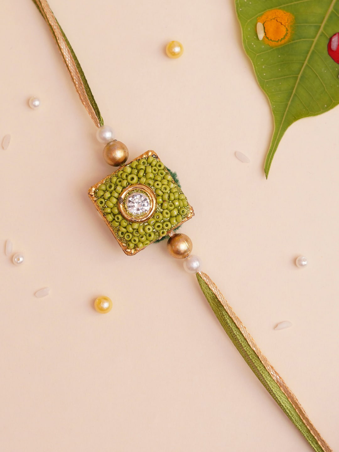 

The Magic Wand Stone-Studded & Beaded Square Charm Rakhi, Green