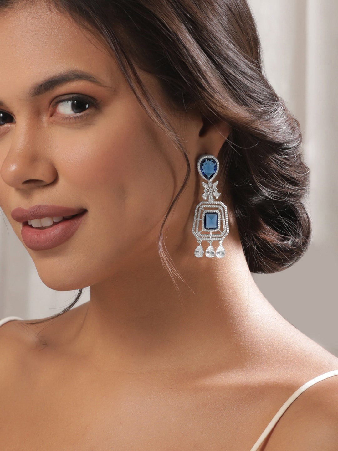 

Rubans Rhodium Plated Blue Sapphire & Zirconia Studded Drop Earrings, Silver