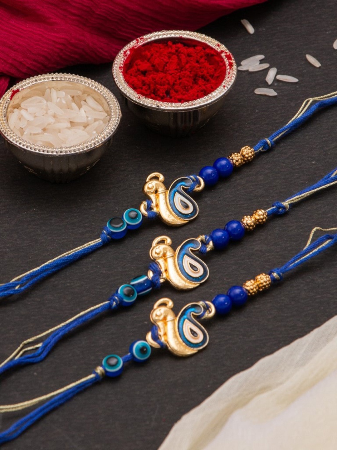 CraftVatika Set Of 3 Peacock Charm Rakhi With Roli & Chawal, Blue