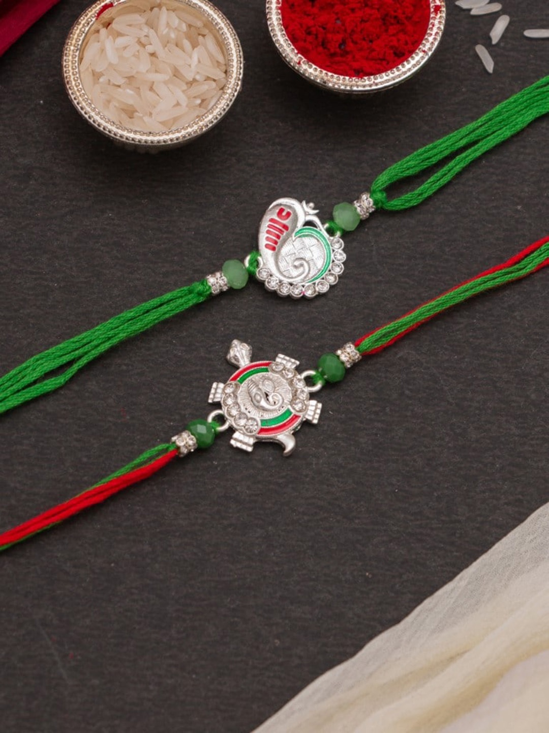 

CraftVatika Set Of 2 Ganesha & Tortoise Rakhi With Roli & RIce, Green