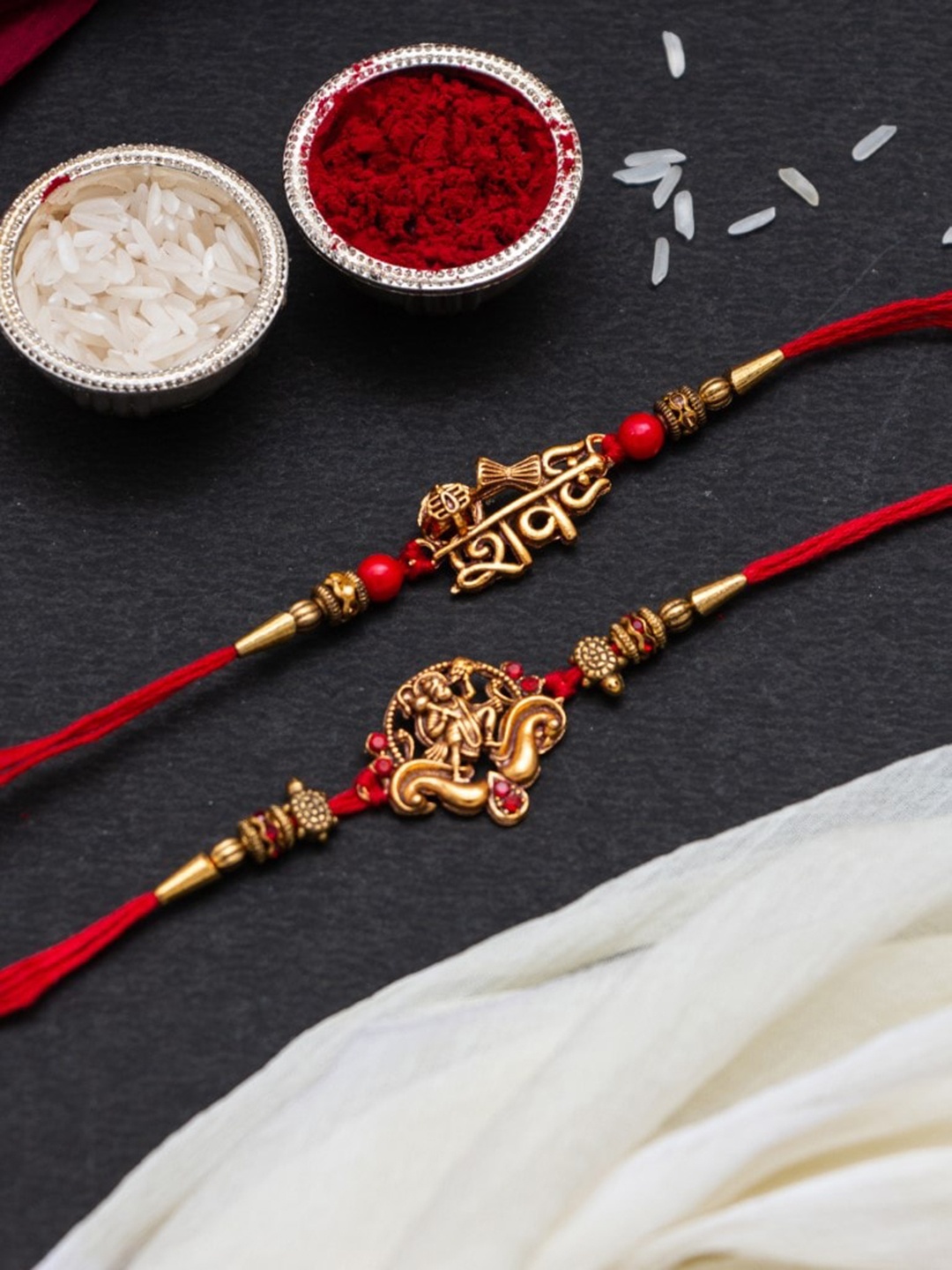 CraftVatika Set Of 2 Hanuman & Shiv Rakhi With Roli & RIce, Red