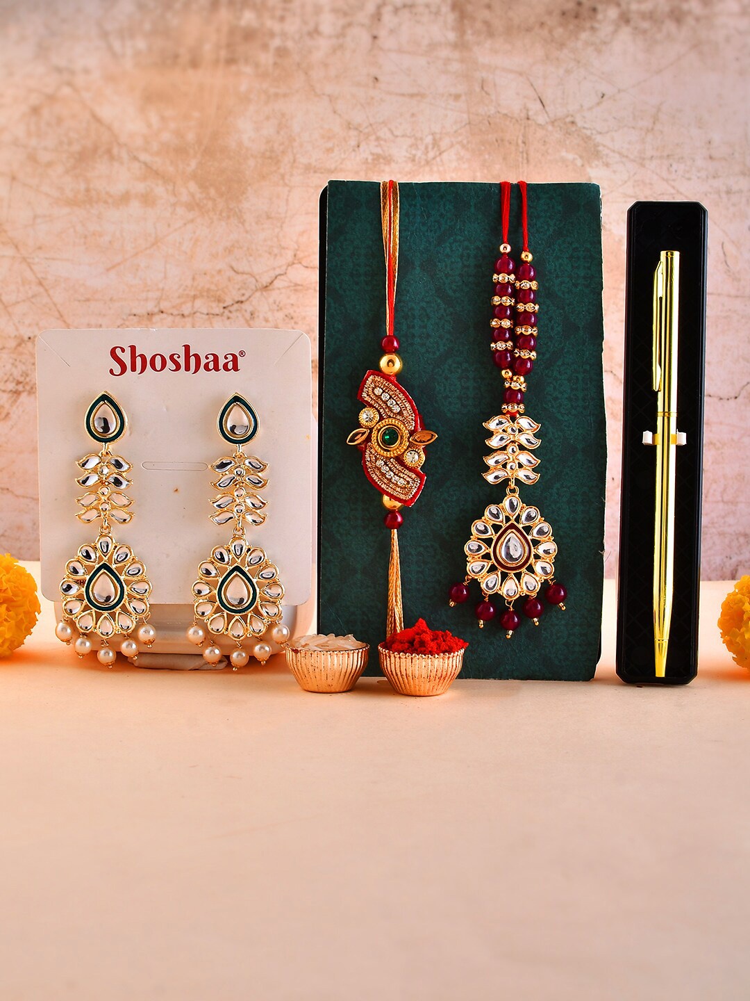 

Shoshaa Kundan Bhaiya Bhabhi Rakhi Lumba With Pen Earrings Gift Set With Roli Chawal, Red