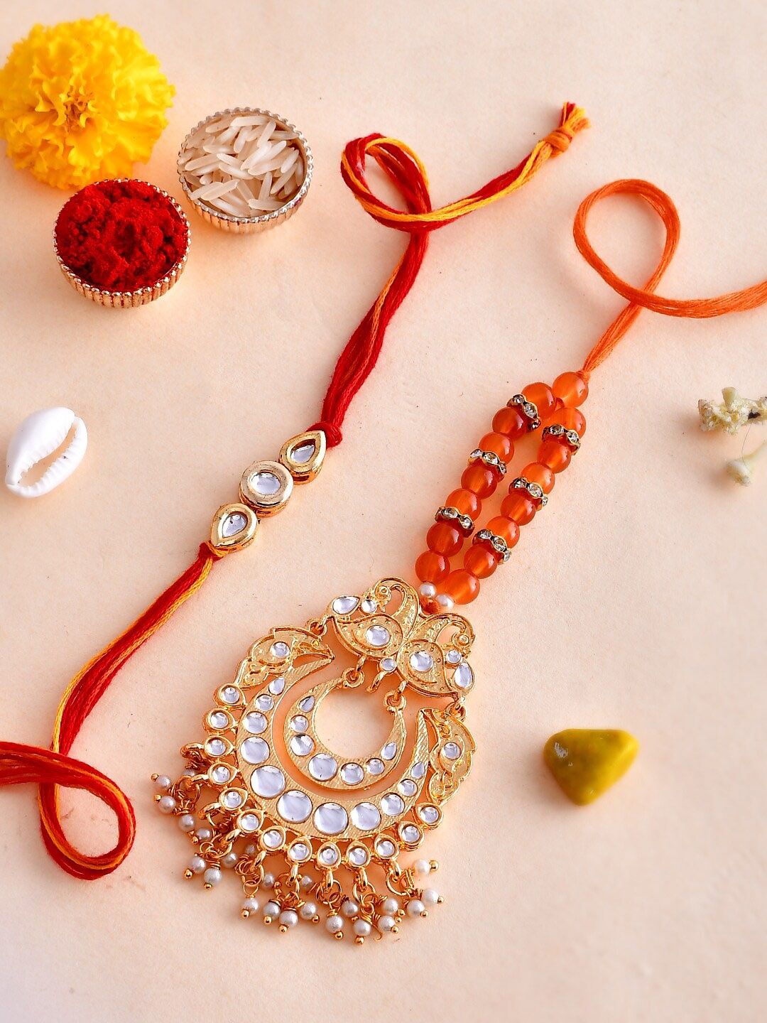 

Shoshaa set of 2 Kundan Orange Bhaiya Bhabhi Rakhi Lumba with Roli Chawal