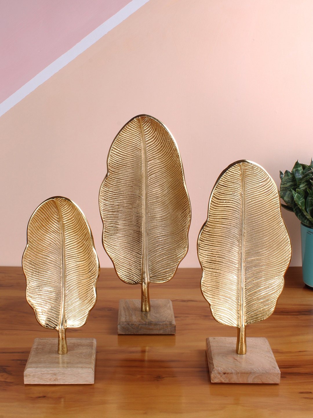 

STITCHNEST Gold-Toned 3-Pieces Hazel Leaf Figurine Showpieces