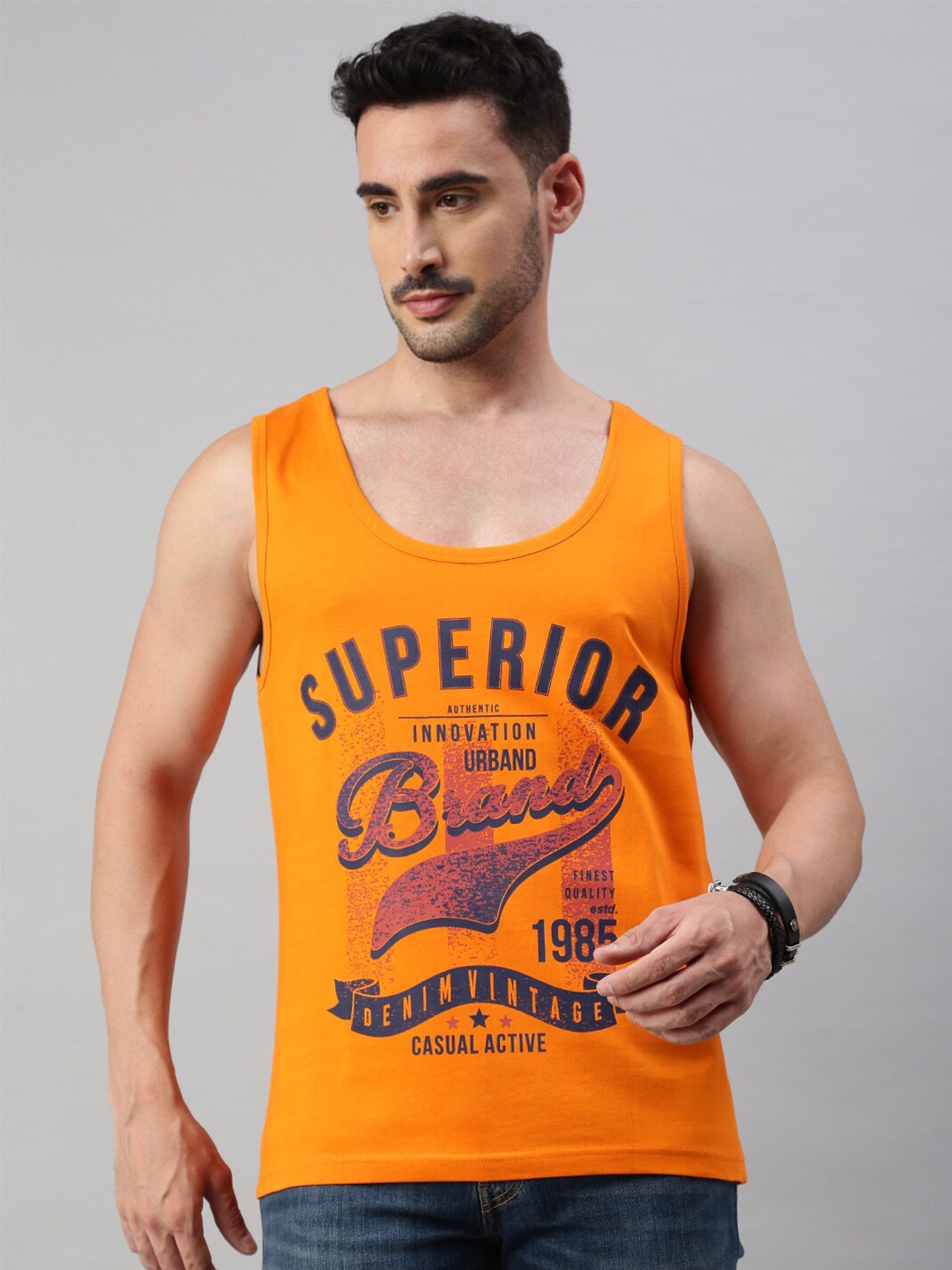 

BLACK RADIO Typography Printed Scoop Neck Sleeveless Regular fit Pure Cotton T-shirt, Orange