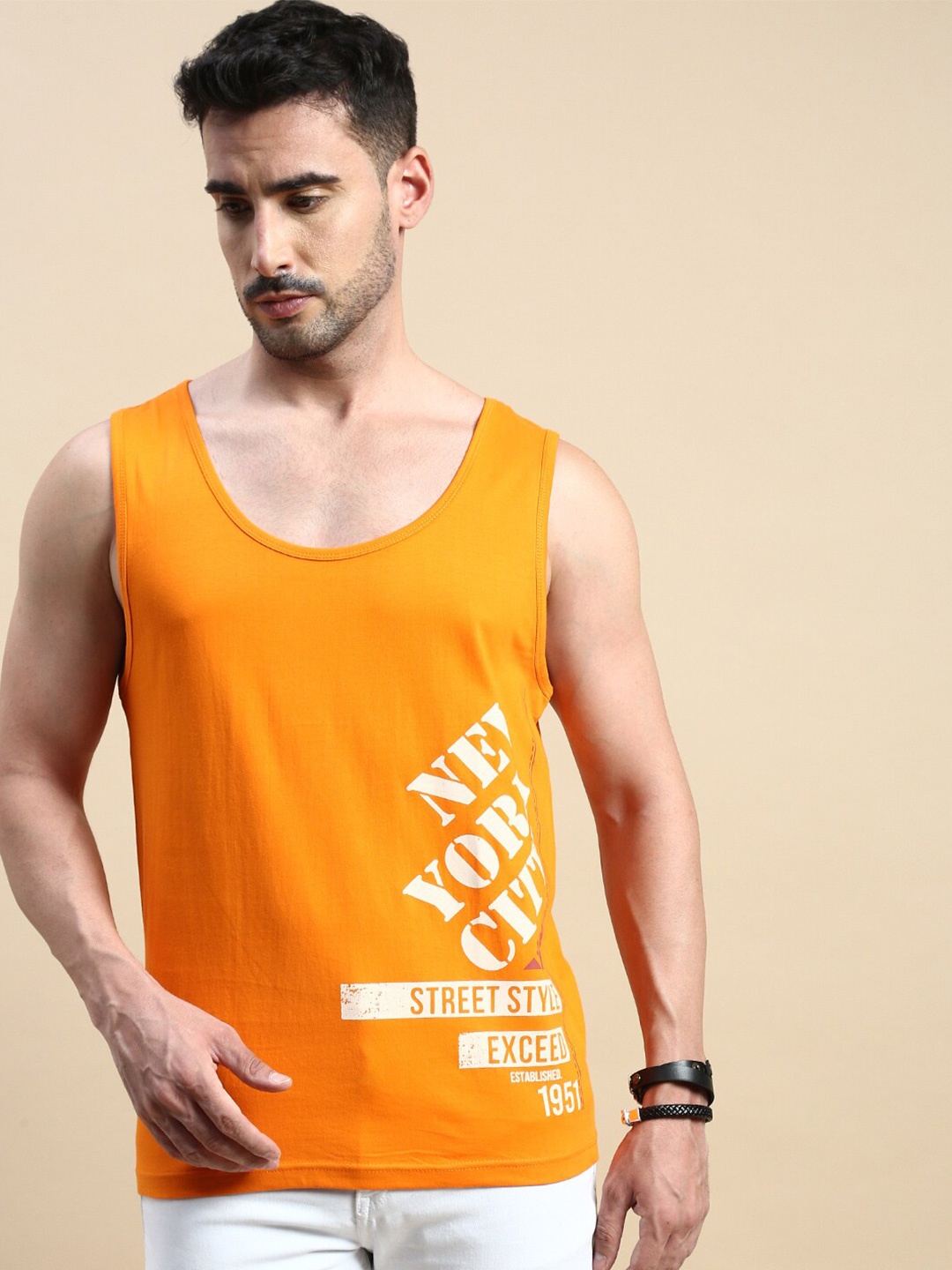 

BLACK RADIO Typography Printed Scoop Neck Sleeveless Regular fit Pure Cotton T-shirt, Orange