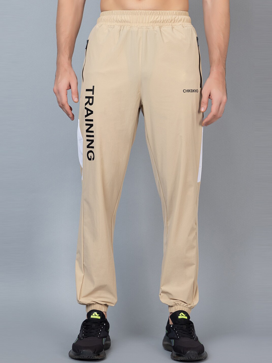 

CHKOKKO Men Regular Fit Mid-Rise Sports Joggers, Beige