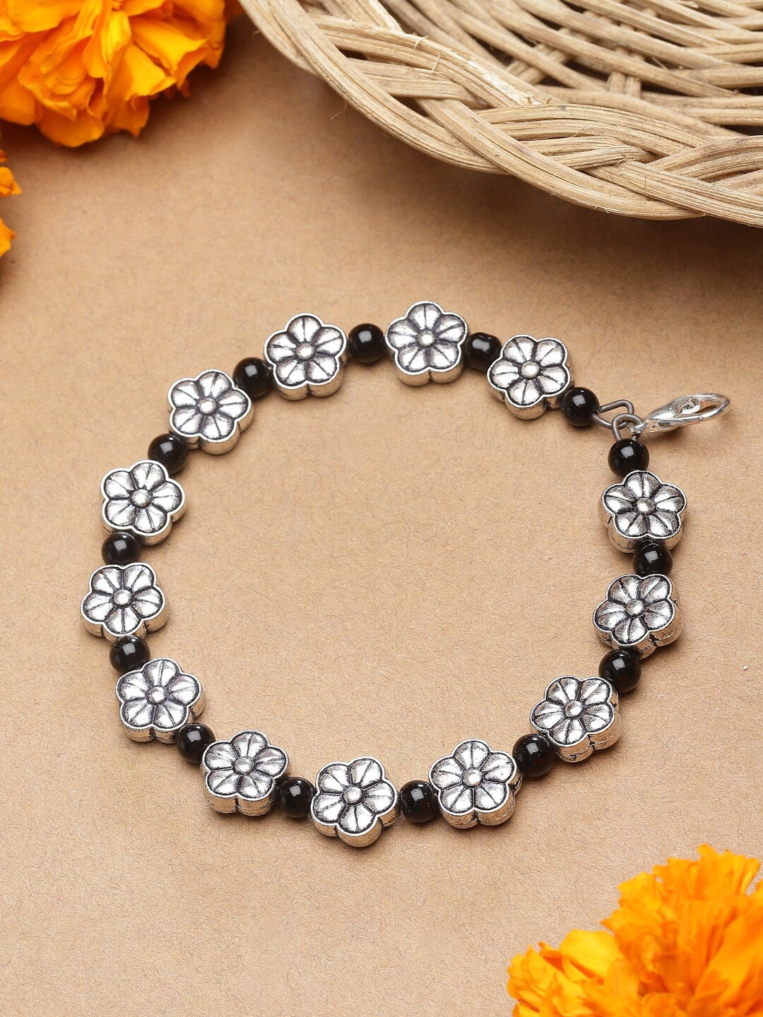 

Sanjog Oxidised Silver-Plated Floral Charm Bracelet Women Girls