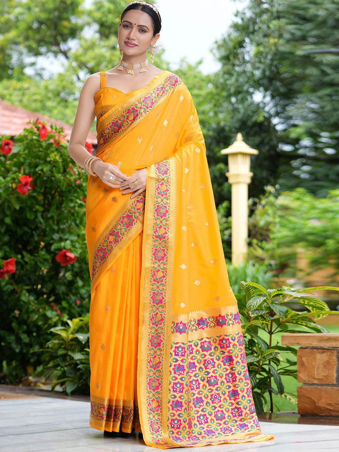 

Satrani Yellow & Pink Ethnic Motifs Woven Design Zari Saree