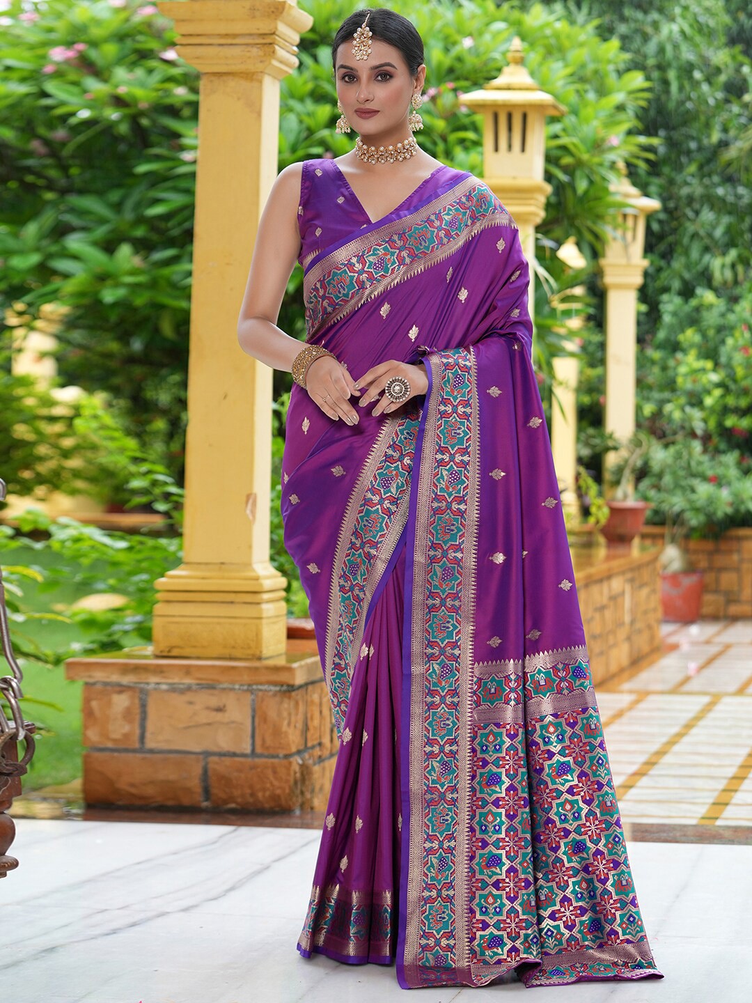 

Satrani Purple & Blue Ethnic Motifs Woven Design Zari Saree