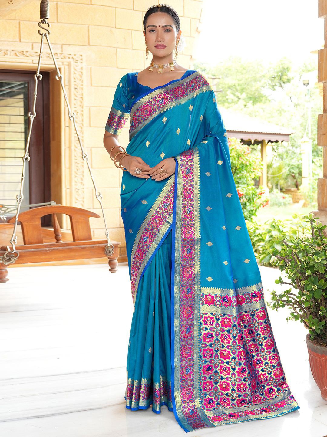 

Satrani Blue & Pink Ethnic Motifs Woven Design Zari Saree
