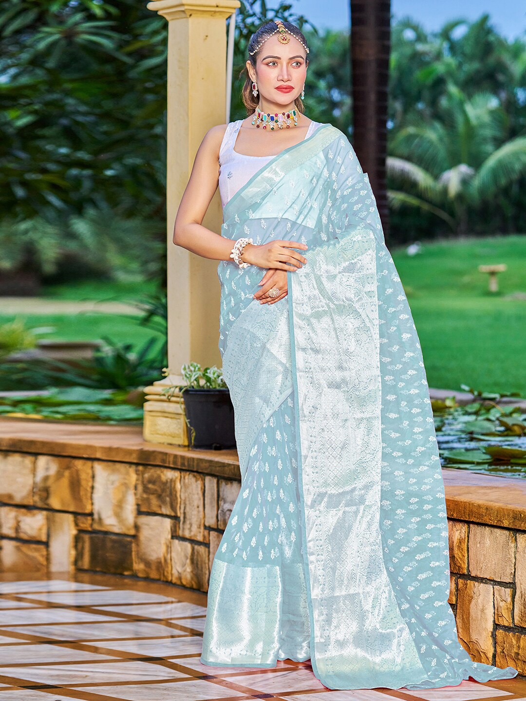 

Satrani Turquoise Blue & White Floral Printed Zari Organza Saree