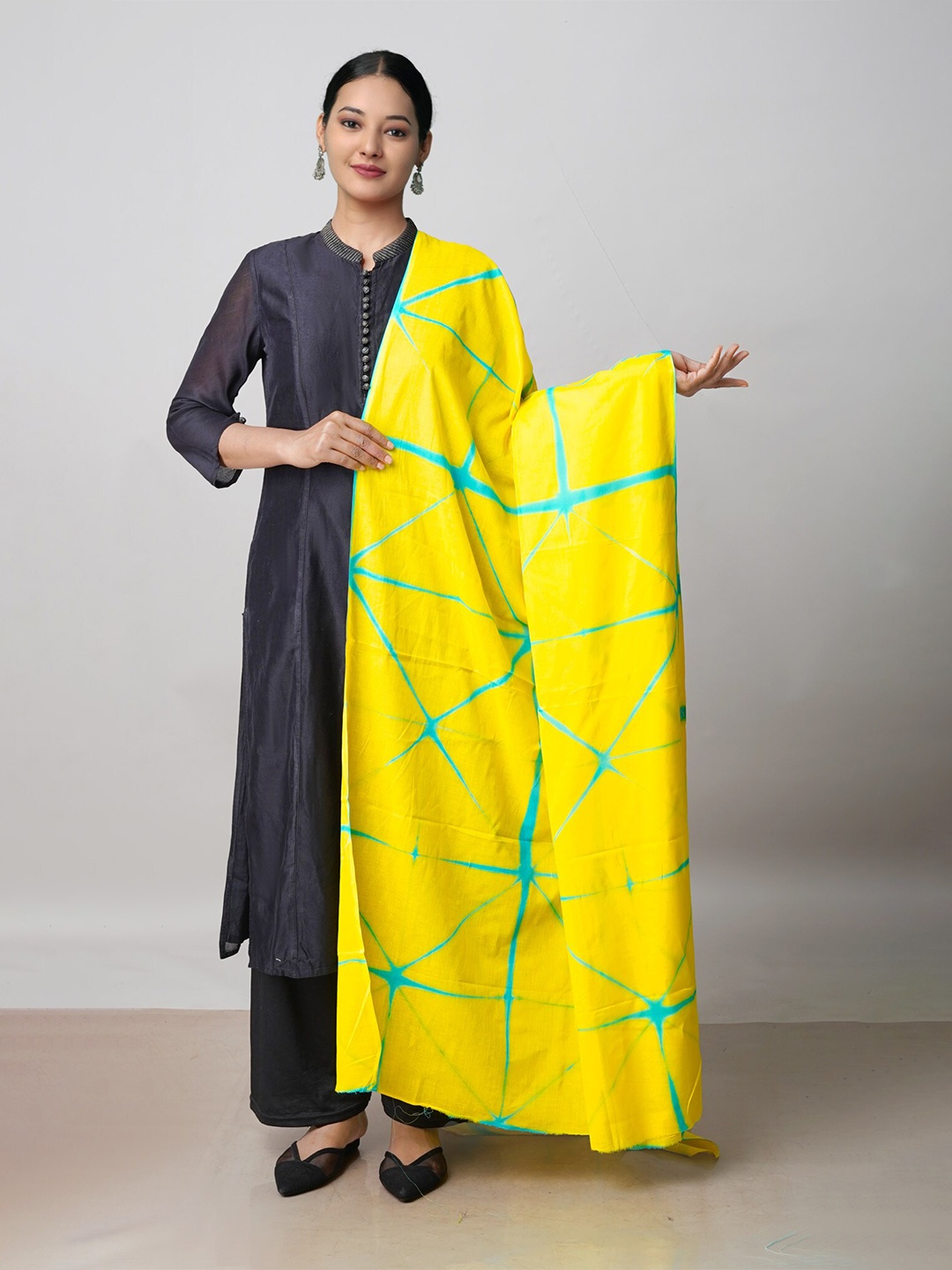 

Unnati Silks Ethnic Motifs Printed Cotton Tie and Dye Dupatta, Yellow