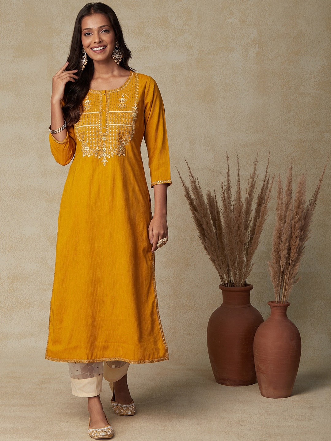 

FASHOR Embroidered Keyhole Neck Flared Sleeves Thread Work Kurta, Mustard