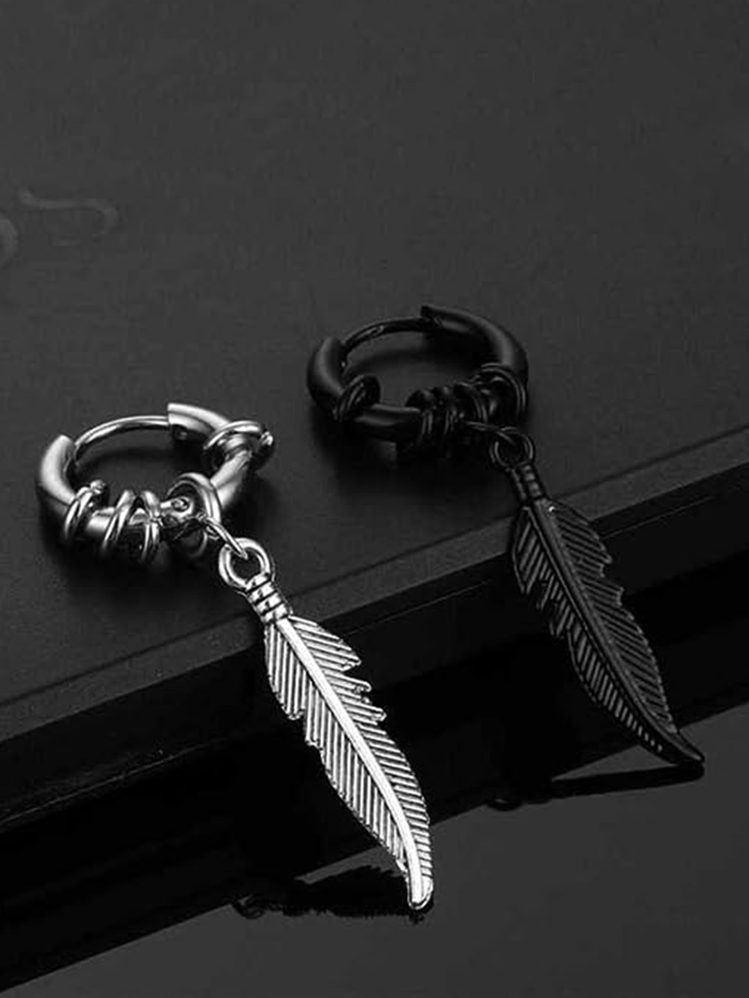 

KRYSTALZ Silver-Plated Feather Shaped Drop Earrings