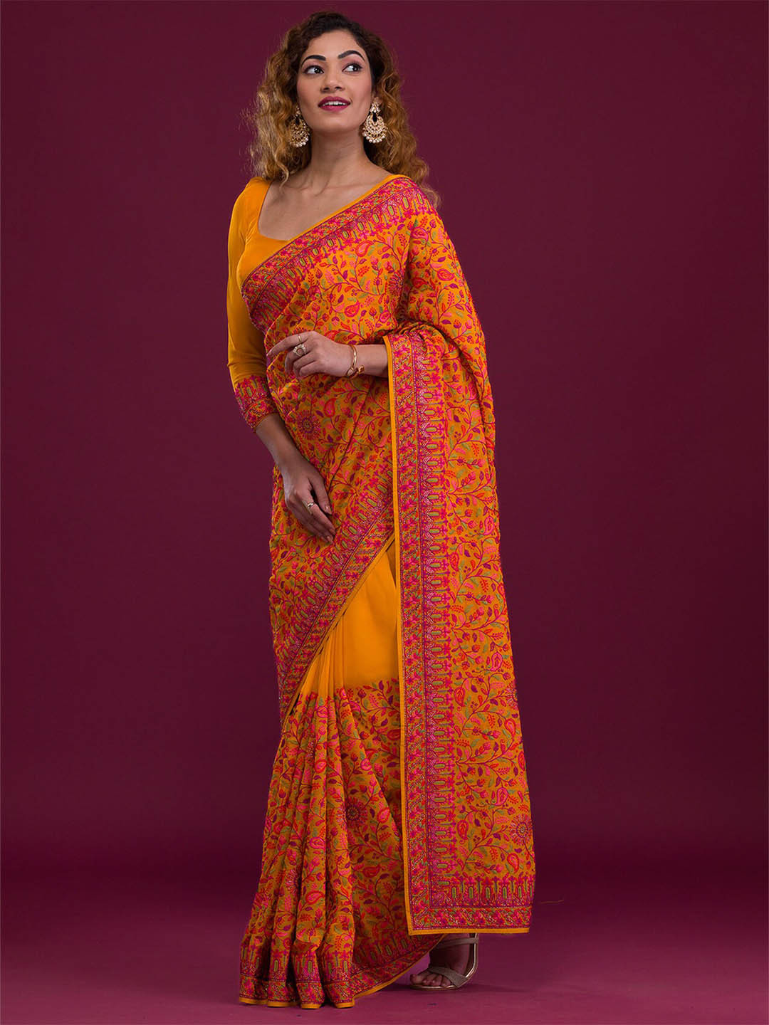 

Koskii Ethnic Motifs Embroidered Poly Georgette Saree, Mustard