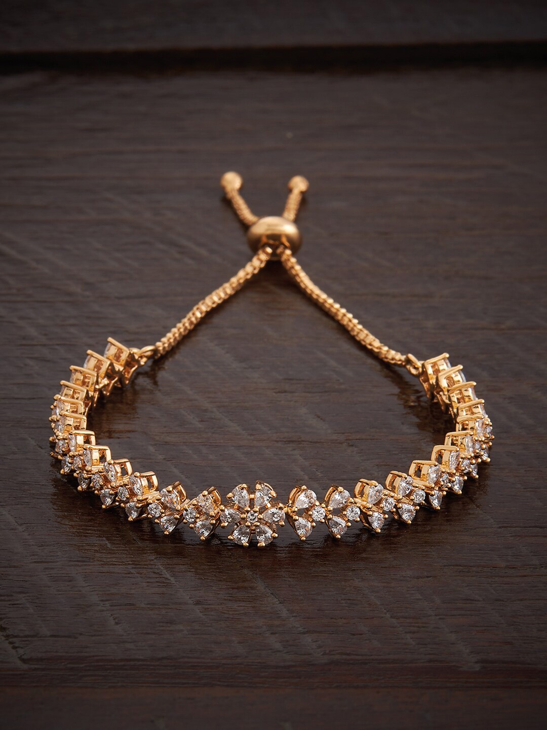 

Kushal's Fashion Jewellery Women Cubic Zirconia Gold-Plated Link Bracelet
