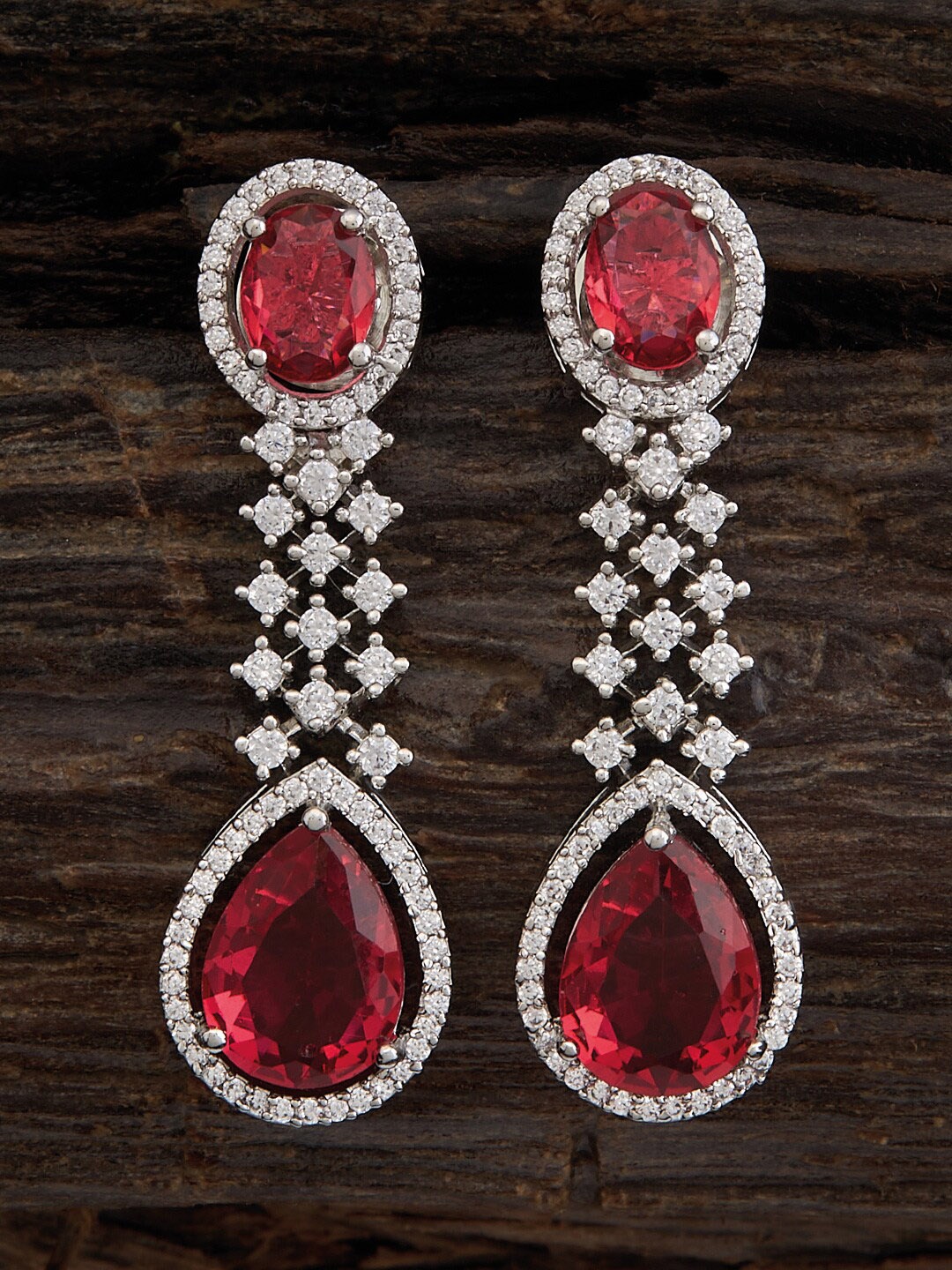 

Kushal's Fashion Jewellery Silver-Toned Teardrop Shaped Studs Earrings