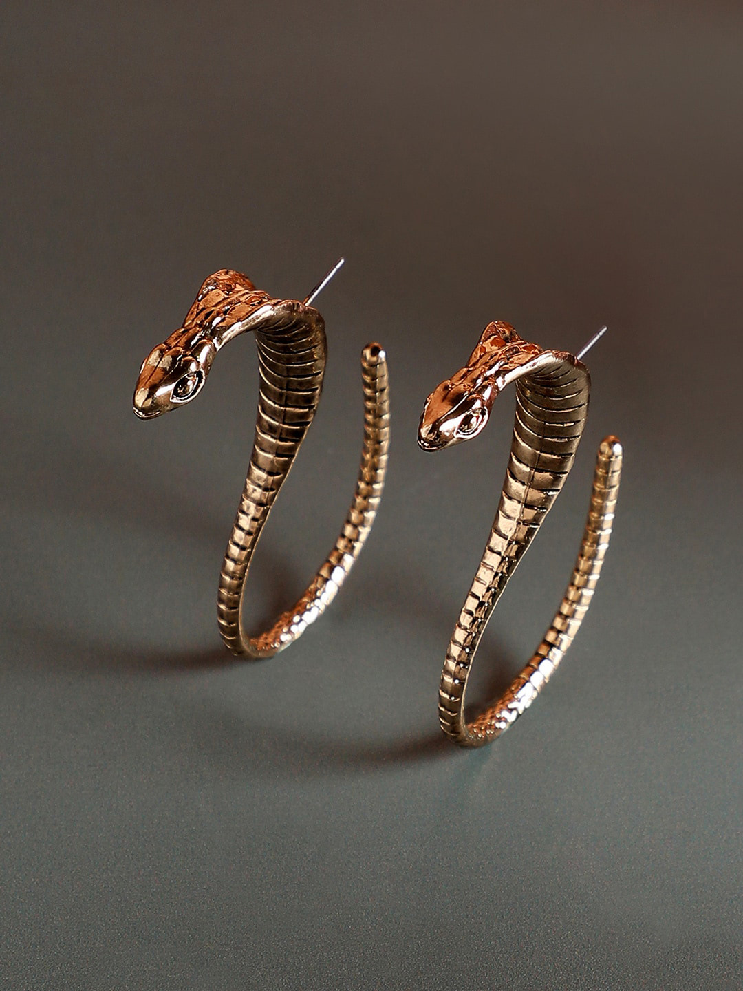 

SOHI Gold-Toned Contemporary Studs Earrings