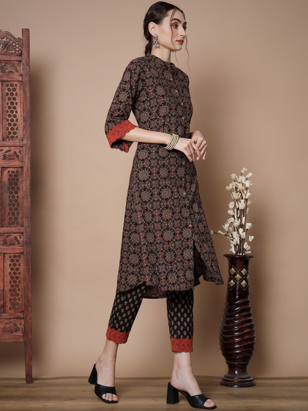

Sangria Black Ethnic Motifs Printed Pure Cotton A-line Kurta With Trousers, Rust