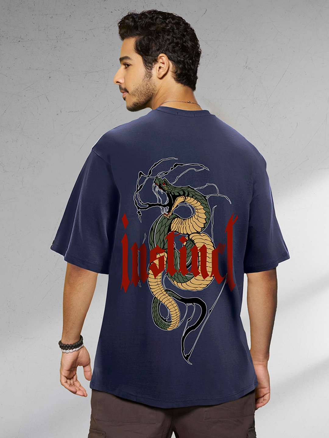 

Bewakoof Navy Blue Typography Printed Drop Shoulder Sleeves Pure Cotton Oversized T-shirt