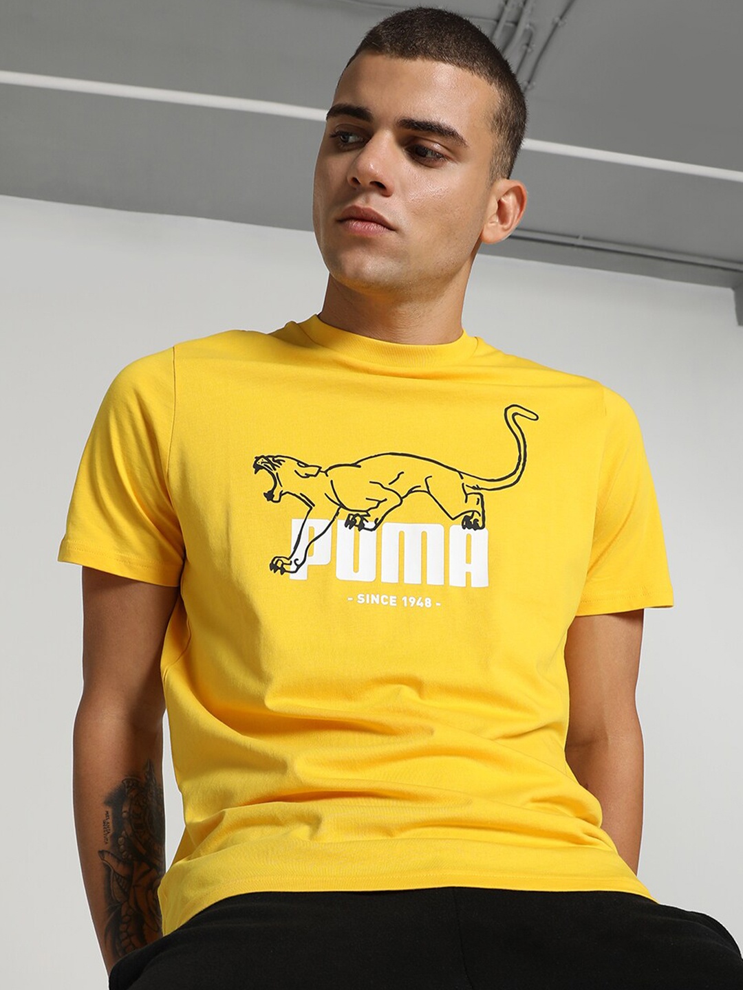 

Puma GRAPHICS Printed Cotton T-Shirts, Yellow