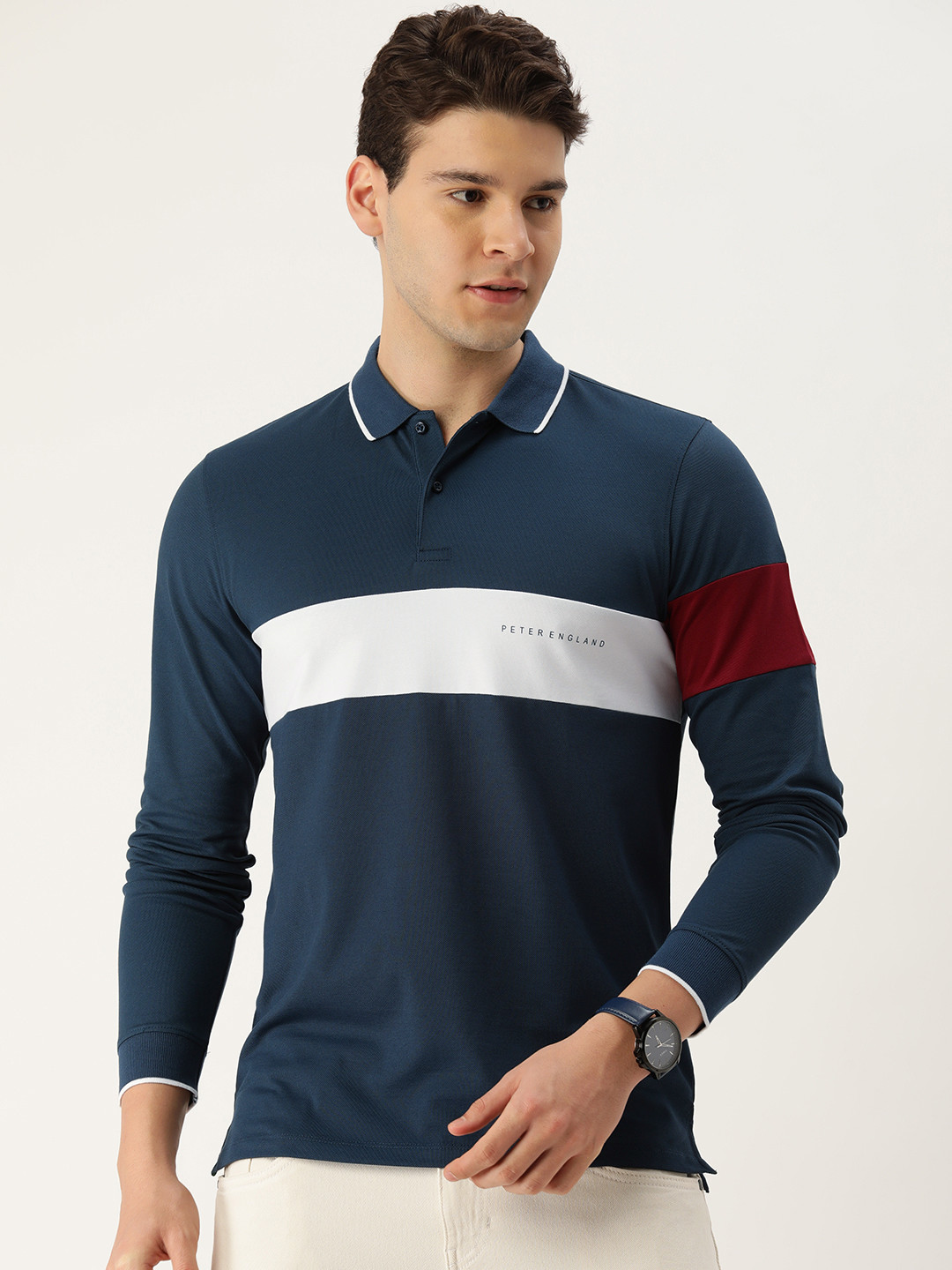 

Peter England Men Striped Polo Collar T-shirt, Teal