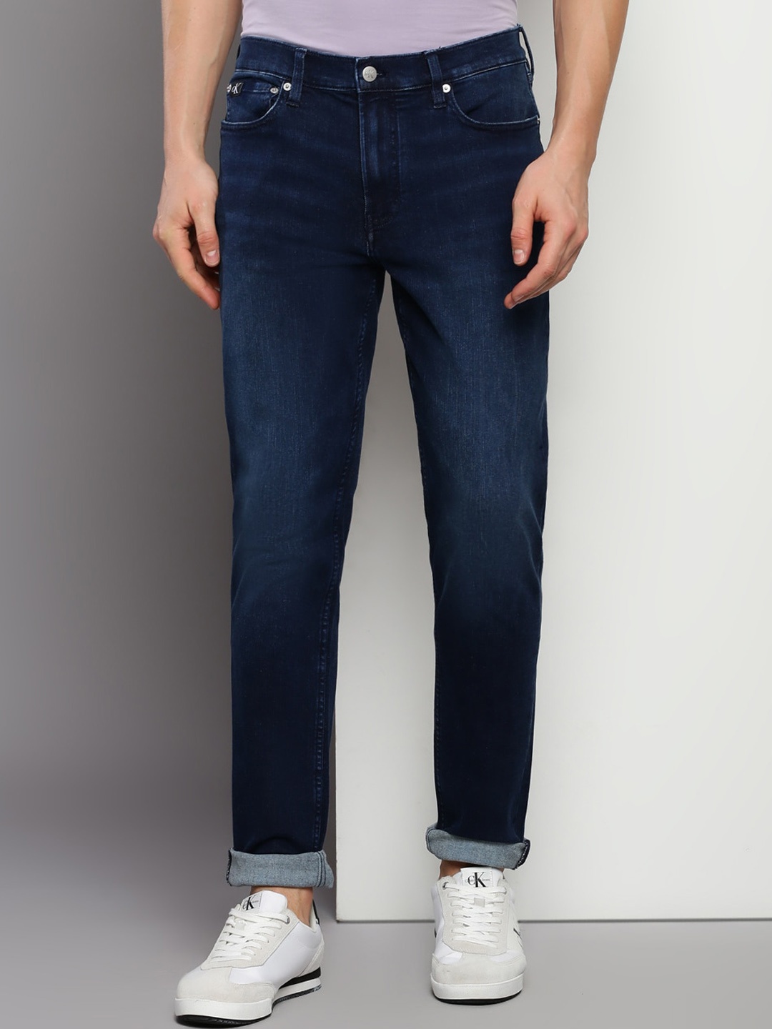 

Calvin Klein Jeans Men Skinny Fit Mid Rise Light Fade Clean Look Cotton Jeans, Navy blue