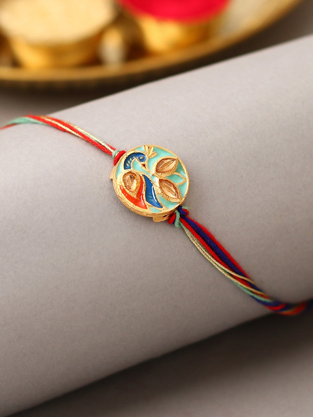 

The Purple Tree Peacock Charm Rakhi, Gold
