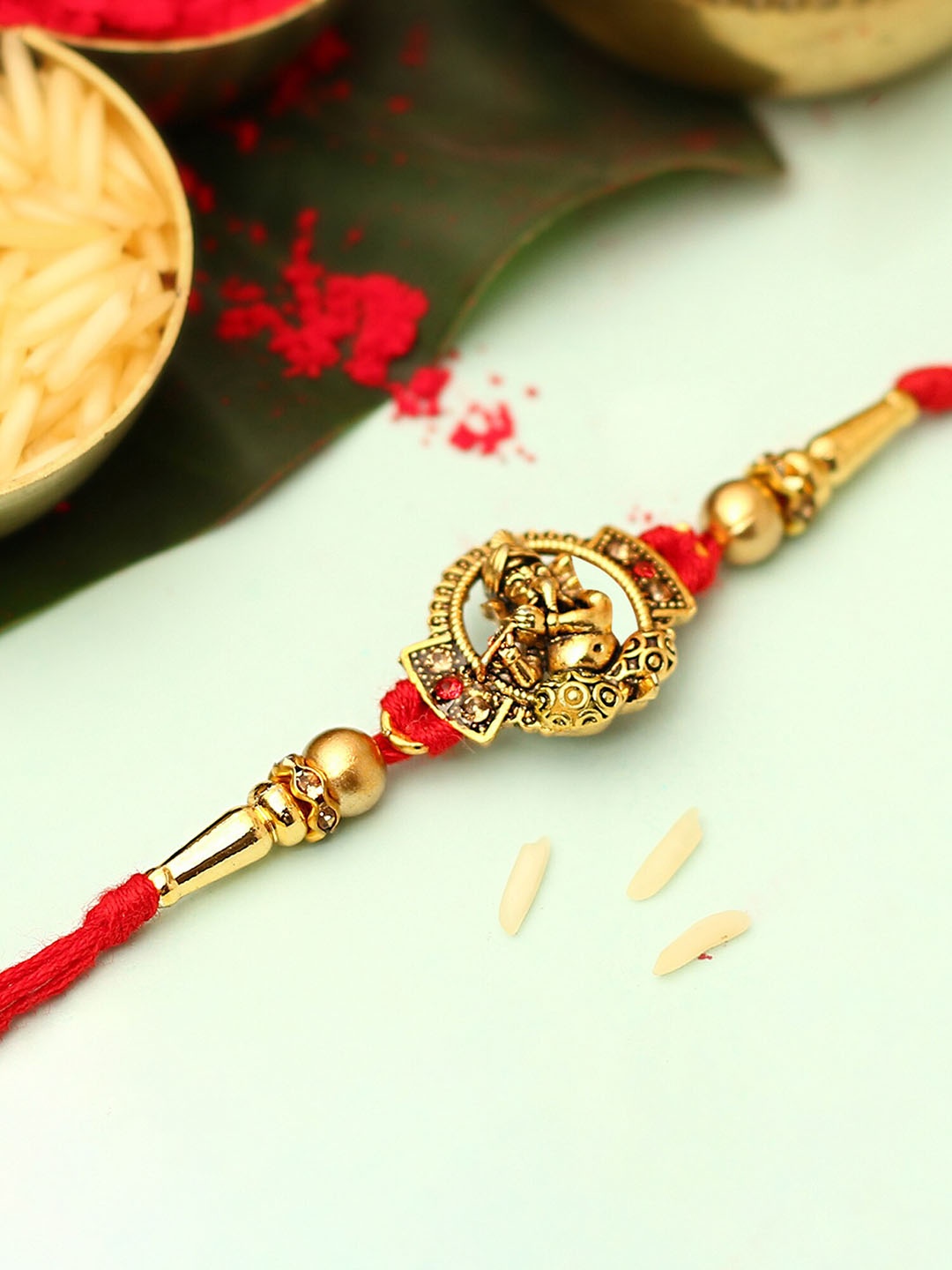 

The Purple Tree Men Lord Ganesha Charm Rakhi, Gold