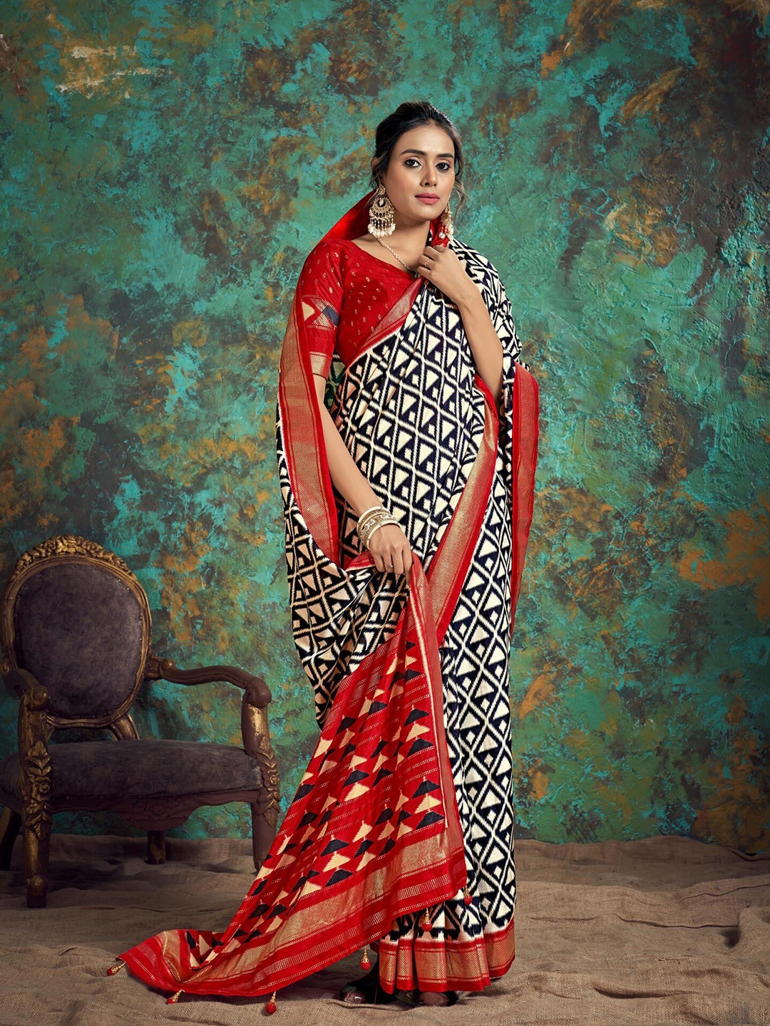 

Mitera Black & Black Geometric Printed Silk Blend Patola Saree