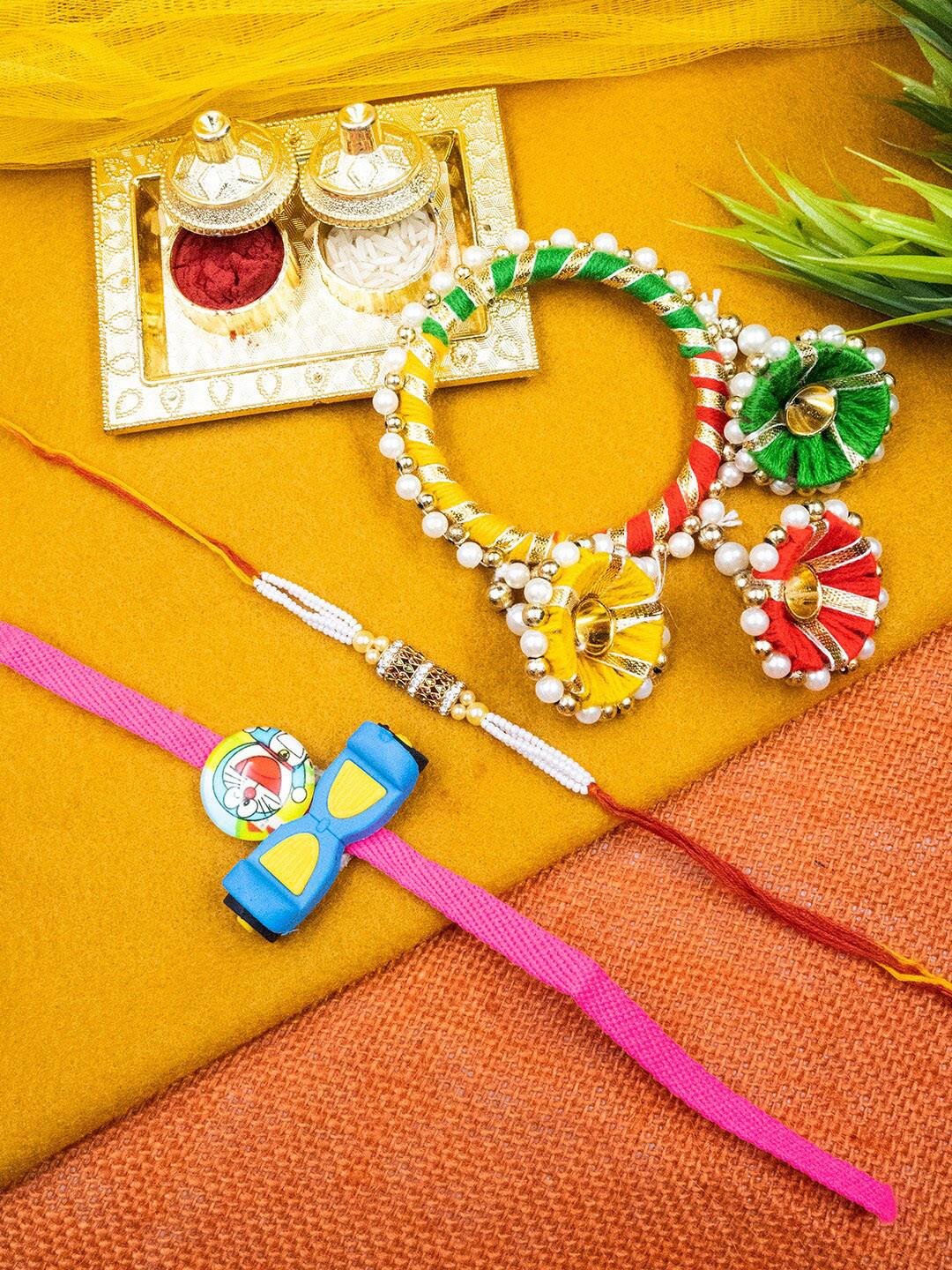 

StileAdda Stone Studded & Beaded Rakhi With Roli & Chawal, Red