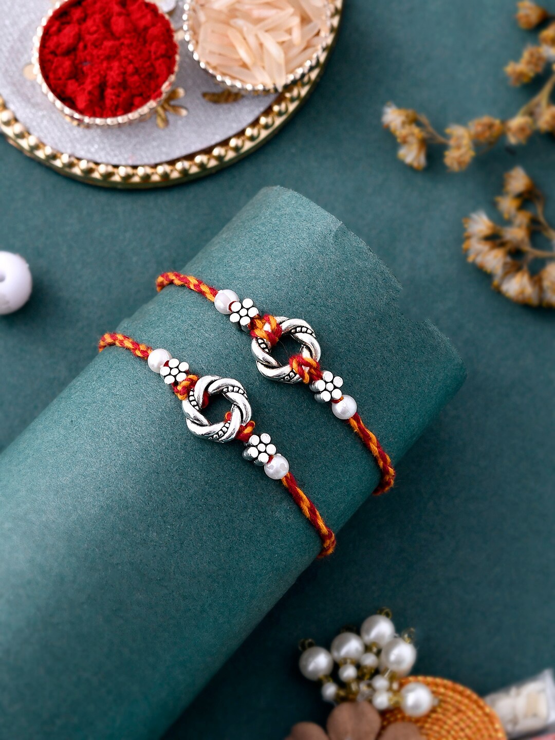 

Aapno Rajasthan Set Of 2 Engraved Braided Rakhis, Silver