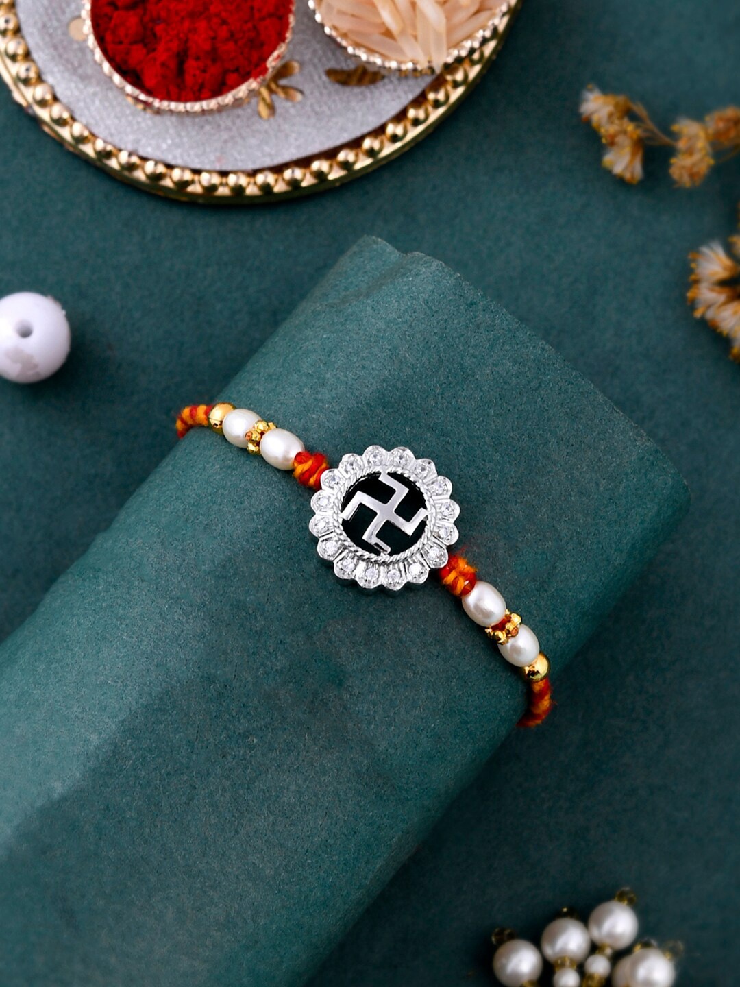 

Aapno Rajasthan Unisex Set Of 4 Swastik Sliver Studded Rakhi, White