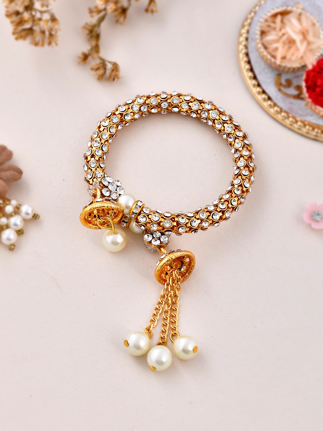 

Aapno Rajasthan Unisex Kundan & Pearl Embellished Elegant Lumba Bracelet Rakhi, Gold