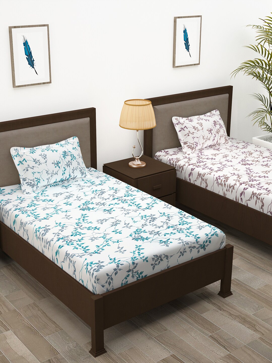 

Story@home Blue & White Floral Cotton 144 TC 2 Single Bedsheet With 2 Pillow Covers