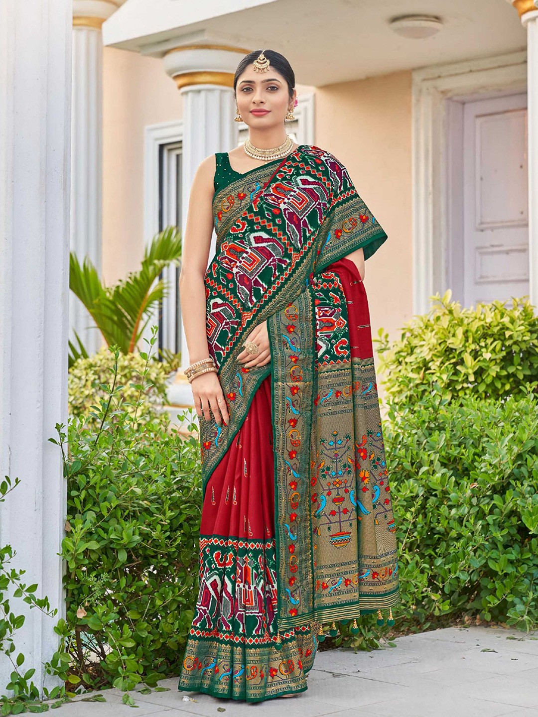 

Mitera Red & Green Ethnic Motifs Printed Zari Patola Saree