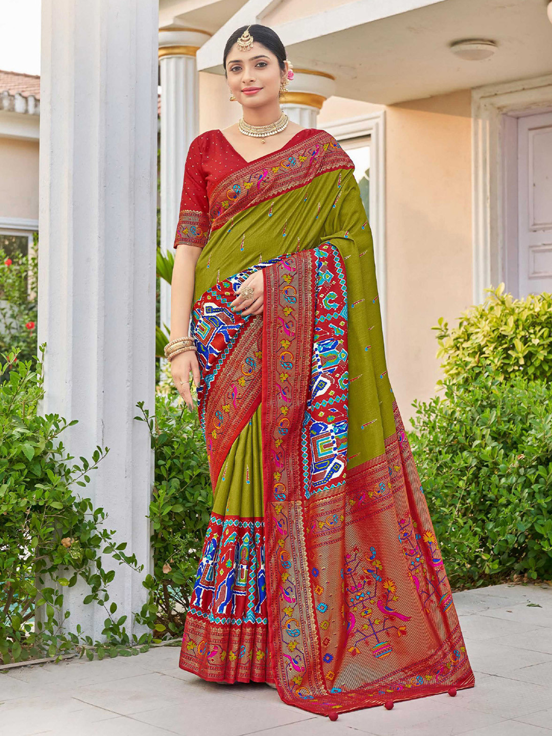 

Mitera Green & Red Ethnic Motifs Printed Zari Patola Saree
