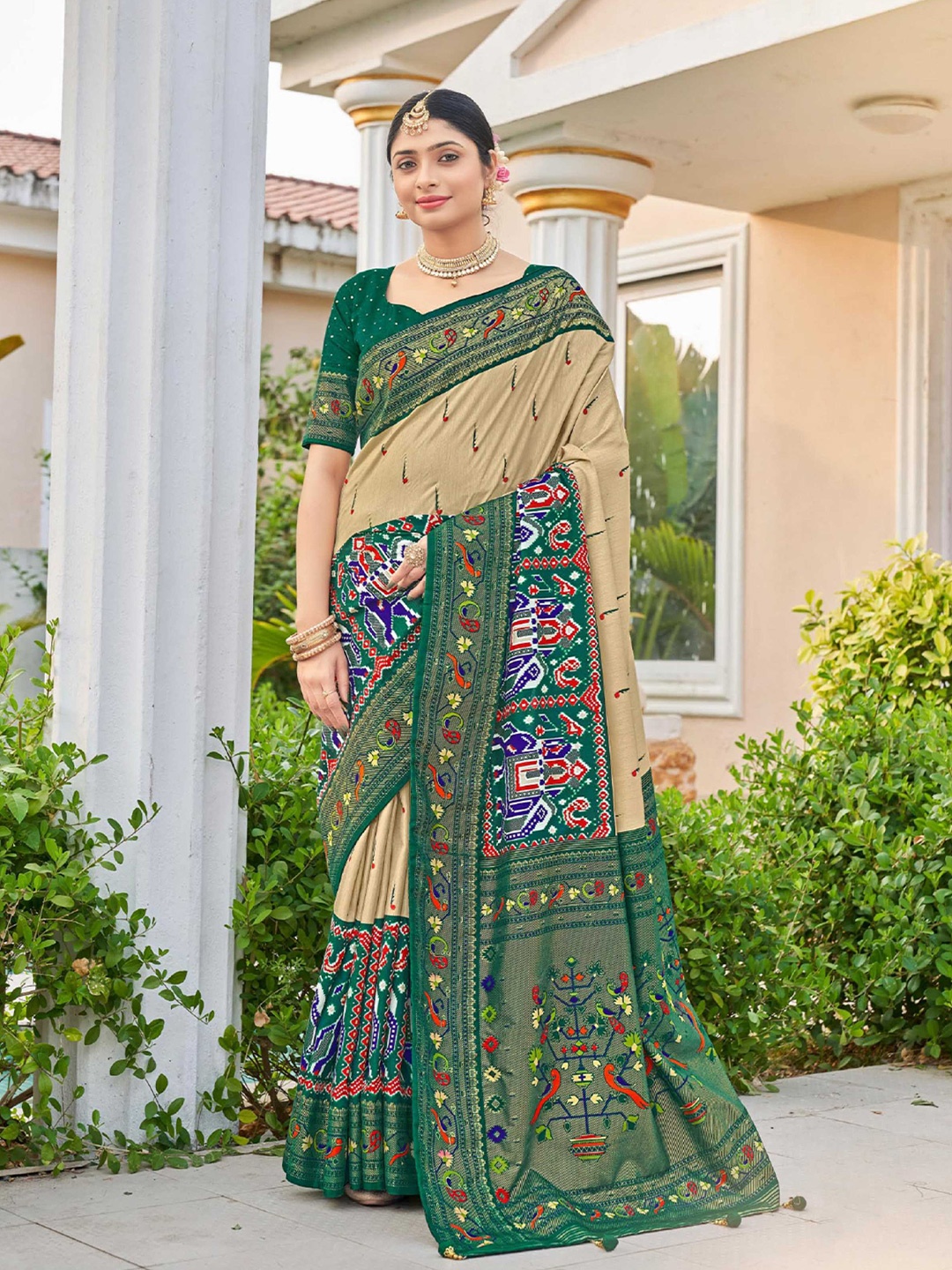 

Mitera Beige & Green Ethnic Motifs Printed Zari Patola Saree