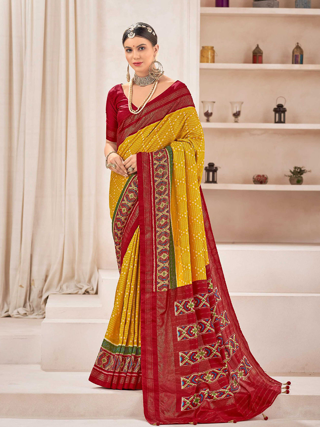 

Mitera Yellow & Red Geometric Printed Zari Patola Saree